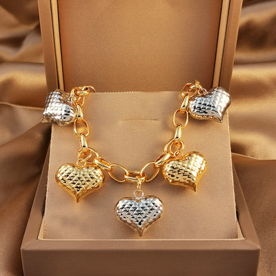 Bracelet en forme de cœur bicolore, best-seller transfrontalier, style luxe accessible du Moyen-Orient, cuivre plaqué or 24 carats et or blanc, populaire auprès des influenceurs en Malaisie
