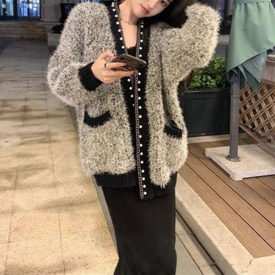 Haut épais chic et tendance avec gilet pull en soie brillante